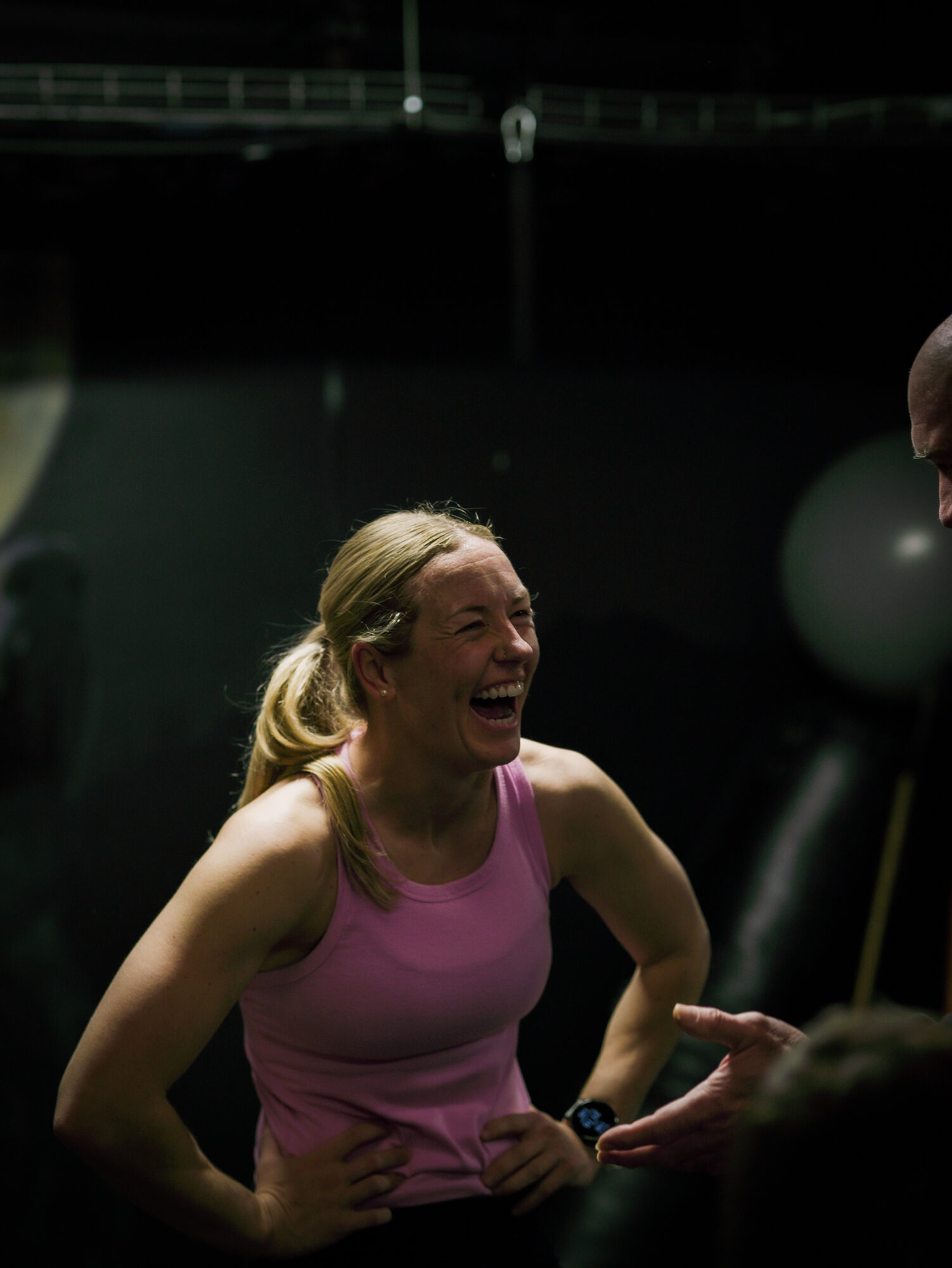 A member laughing mid-session