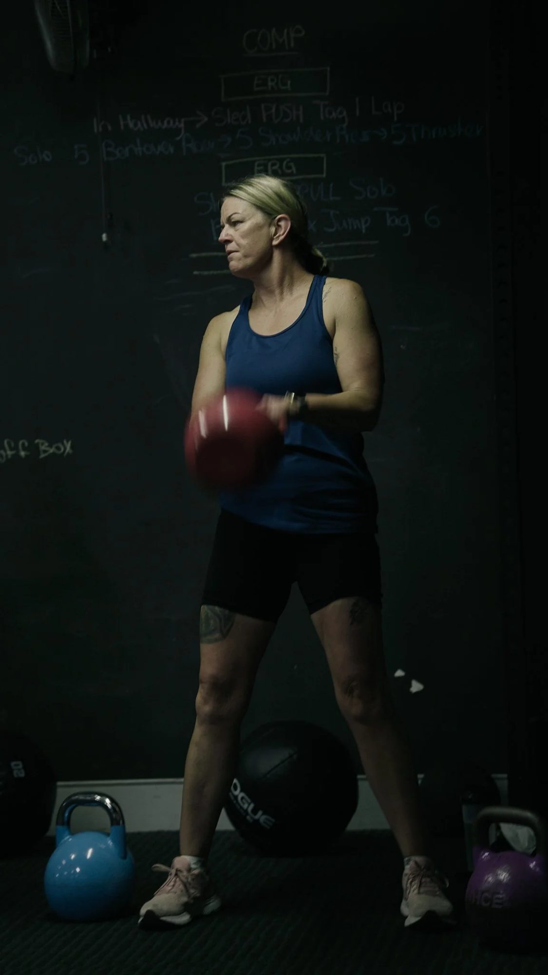 A coach working with members