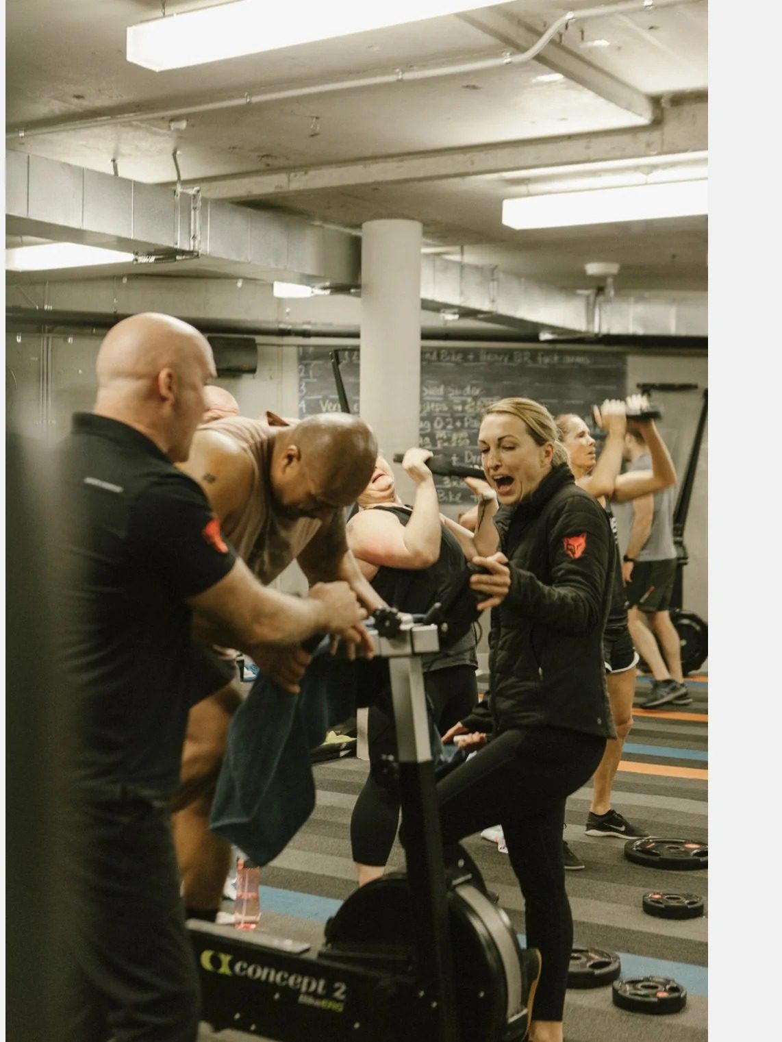 A coach with members mid-session